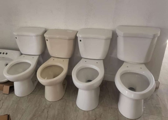 Toilets in white and beige